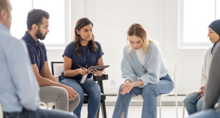 People in a group therapy session.