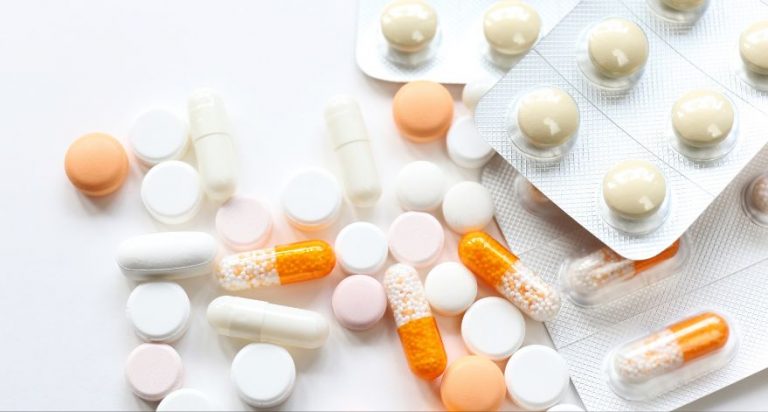 White and orange pills